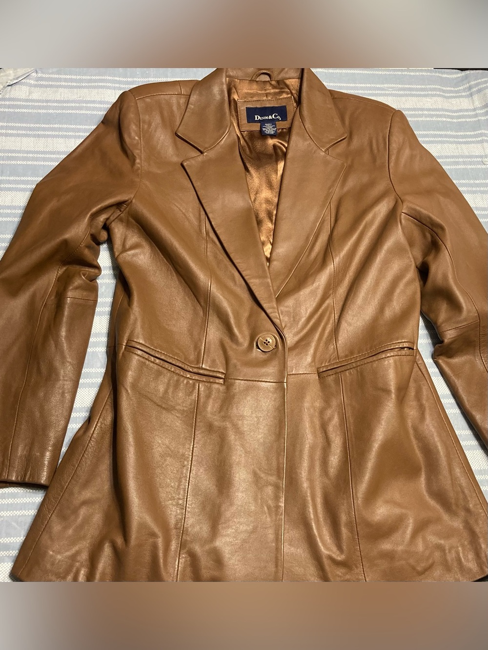 Denim&Co caramel colored leather coat.